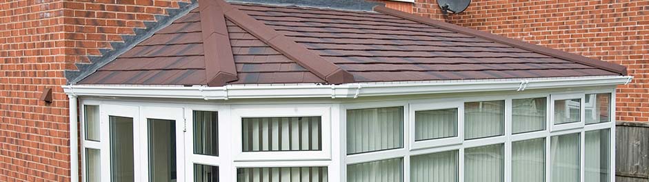 Conservatory refurbished with a Metrotile Lightweight Roof System Shingle Charcoal Burnt Umber