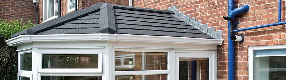 Conservatory refurbished with a Metrotile Lightweight Roof System Shingle Charcoal