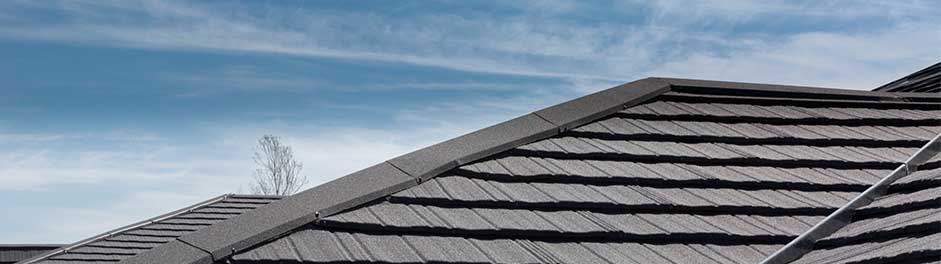 Bryn Bach Park Visitor Centre with Charcoal Metrotile Lightweight Roofing Slate .900 extra secure solution