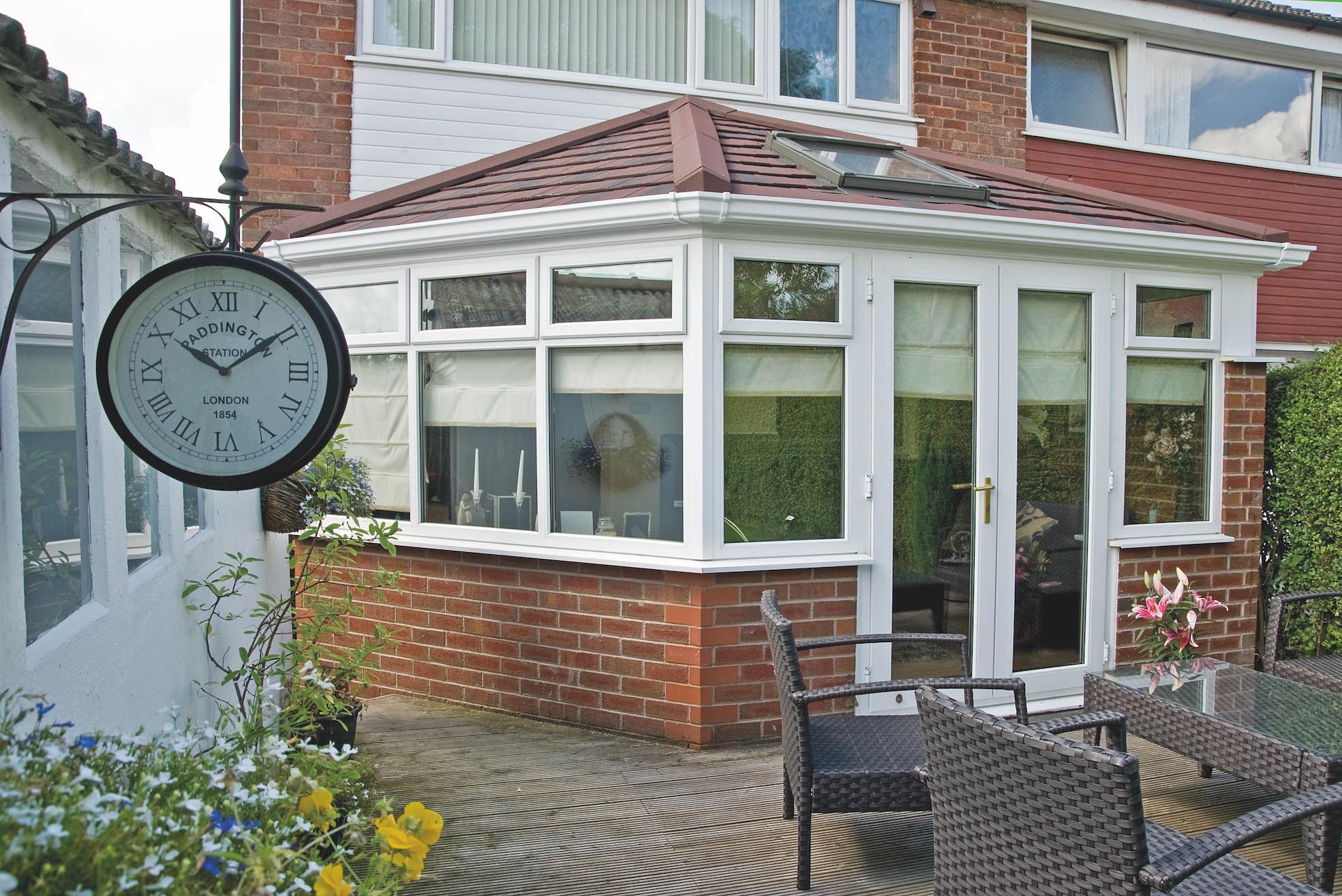 Conservatory refurbished with a Metrotile Lightweight Roof System Shingle Antique Red
