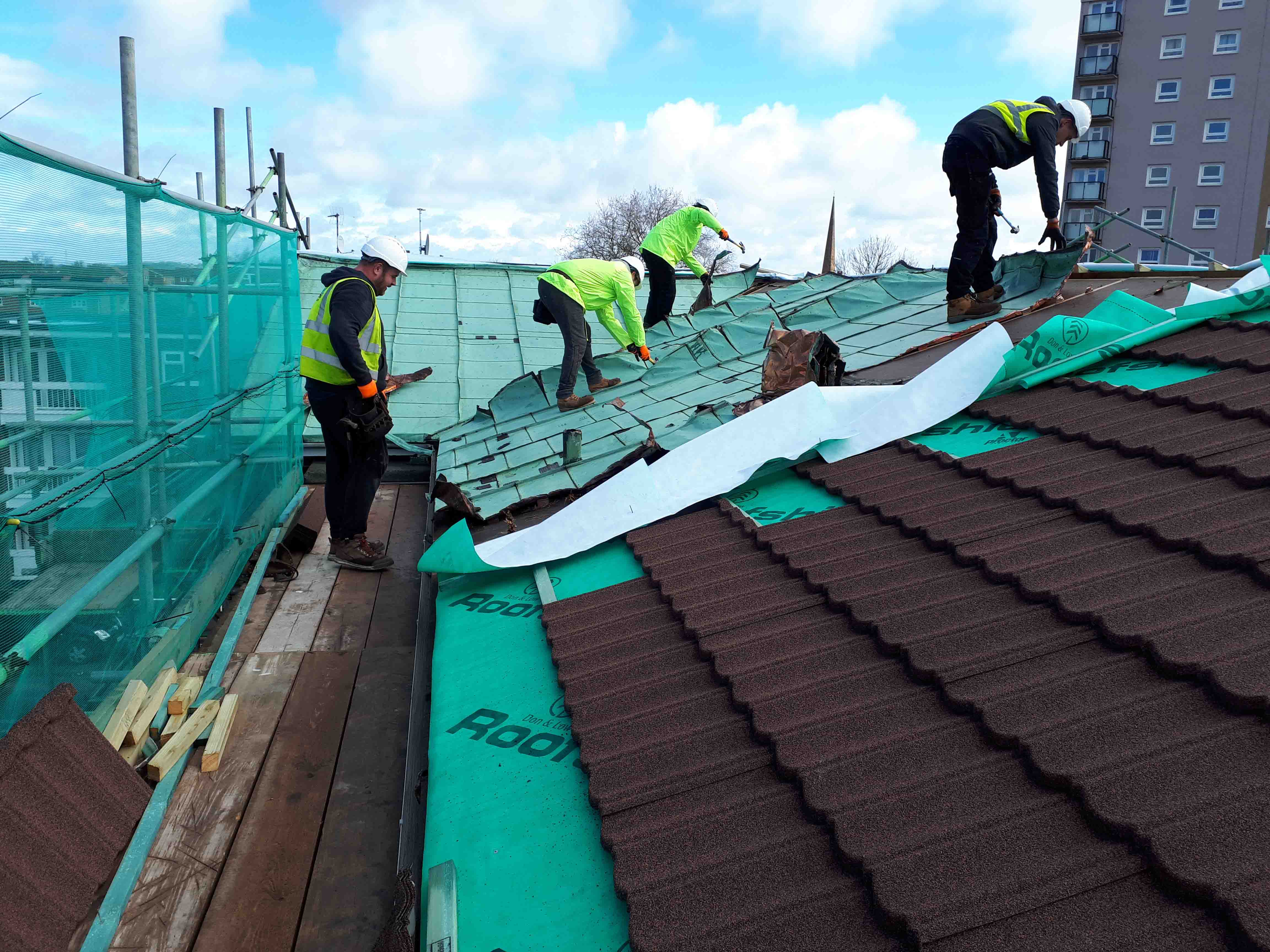 Contractors installing Metrotile roof on Homes in Sedgemoor Bridgwater Flat Refurbishment In Progress 2