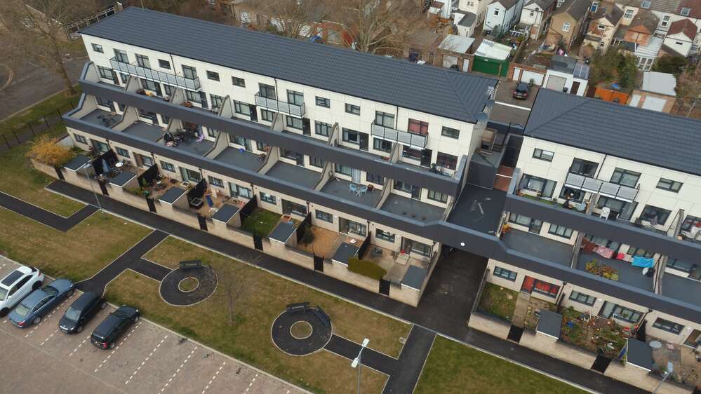 Grove and Tower Court Flats (four blocks, originally flat-roofed)