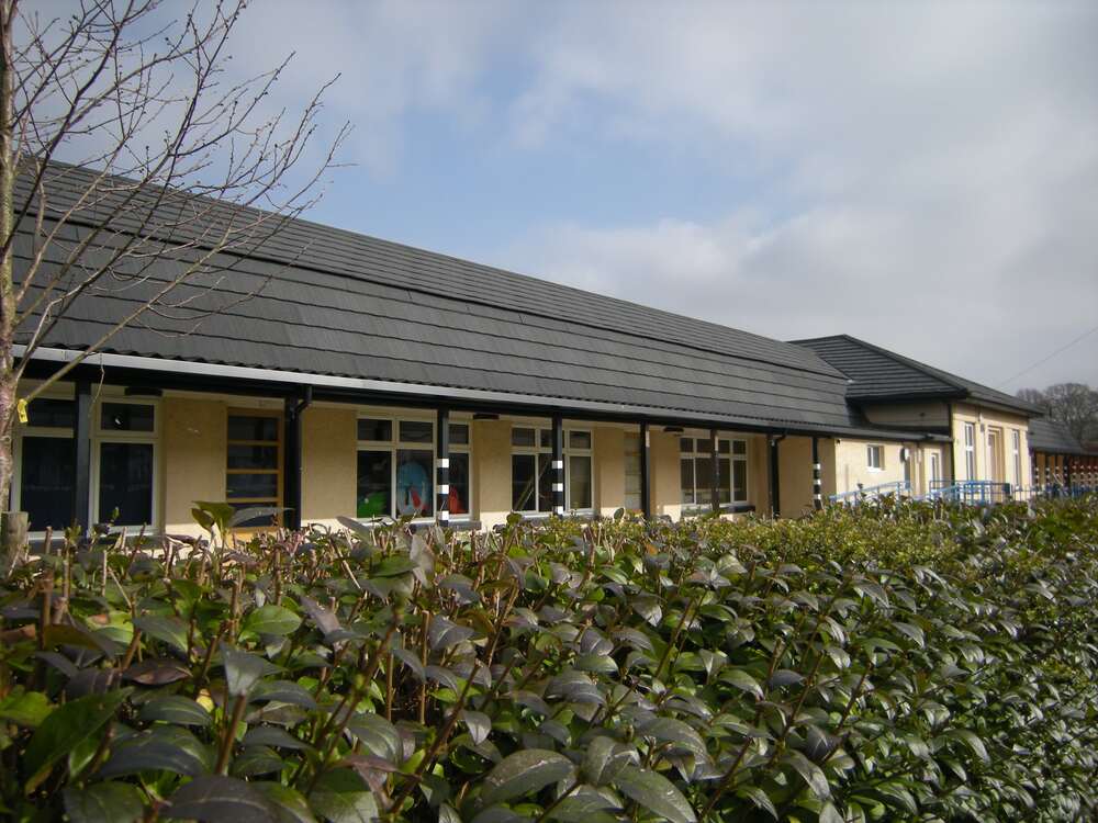 Archbishop Cranmer School. School and Nursery (angular mansard roofs, ~250 pupils)